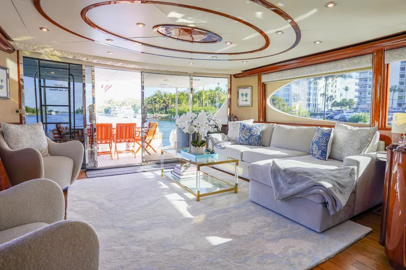 Slide: The Image of Luxurious interior of 2004 Lazzara 80 SL yacht with elegant seating and scenic views. - 23