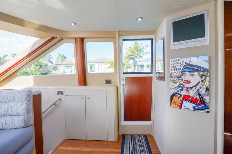 Slide: The Image of Interior of 2004 Lazzara 80 SL yacht with modern decor and pop art. - 35