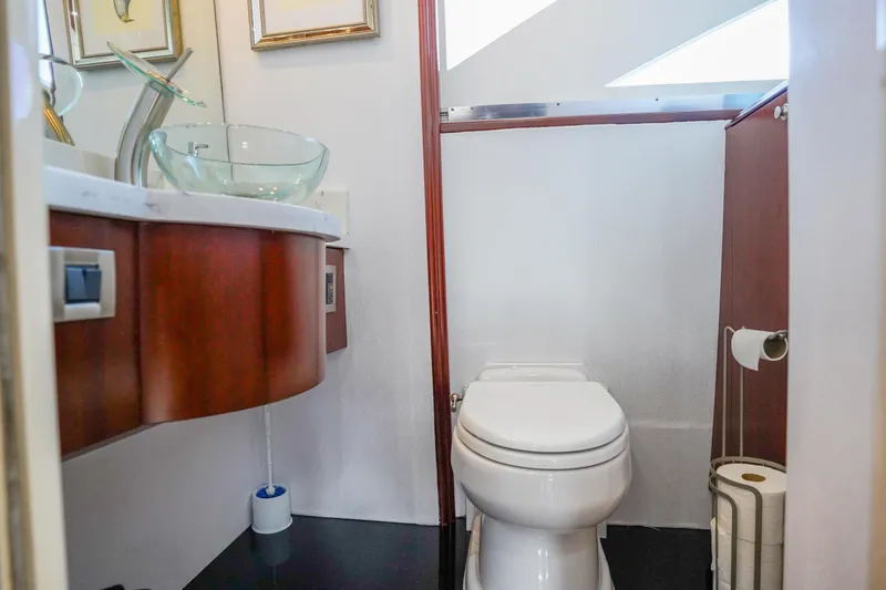 Slide: The Image of Luxurious bathroom in 2004 Lazzara 80 SL yacht with modern fixtures and elegant design. - 37