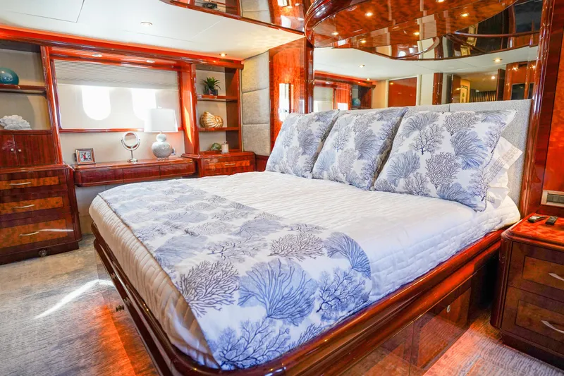 Slide: The Image of Luxurious bedroom interior of 2004 Lazzara 80 SL yacht with elegant wood finishes. - 43