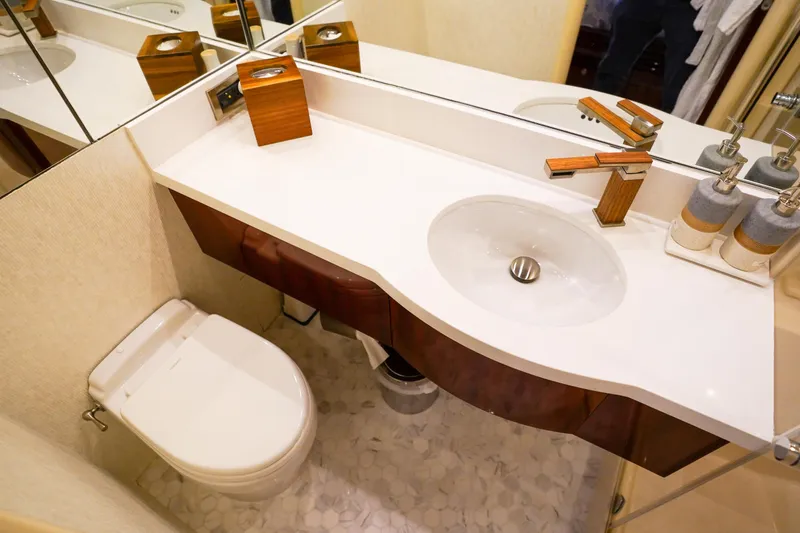 Slide: The Image of Luxury yacht bathroom with modern sink and toilet, Lazzara 80 SL, 2004 model. - 52
