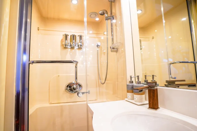 Slide: The Image of Luxurious bathroom in 2004 Lazzara 80 SL yacht with modern fixtures and elegant design. - 55