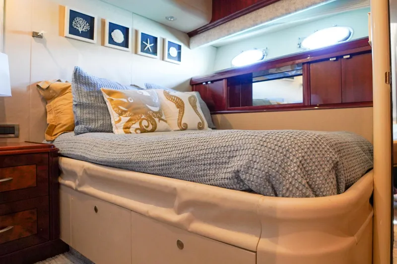 Slide: The Image of Luxurious bedroom interior of 2004 Lazzara 80 SL yacht with nautical decor. - 58