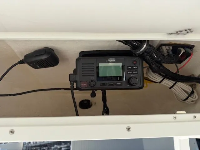 Slide: The Image of Garmin marine radio installed on 2022 Sea Hunt 234 boat. - 16