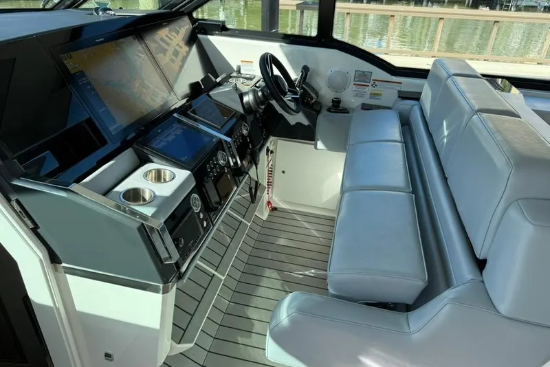 Slide: The Image of Luxurious interior of 2022 Formula 500 Super Sport Crossover yacht with sleek seating and modern design. - 26