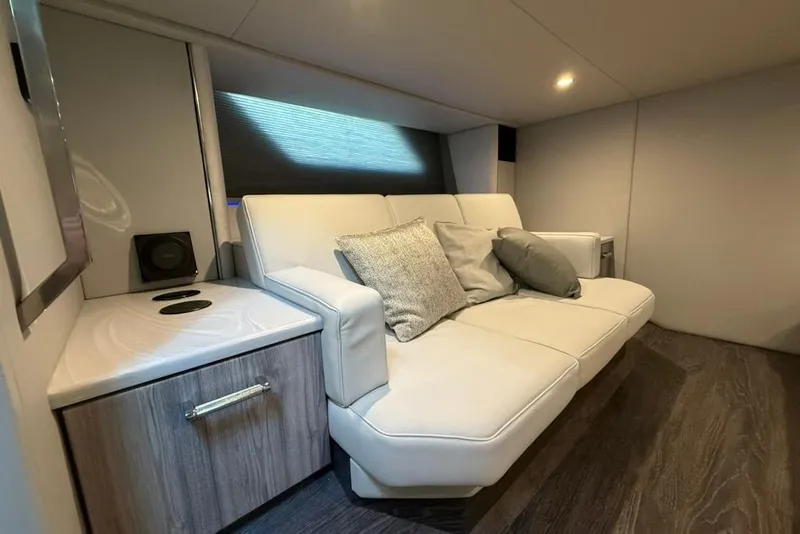 Slide: The Image of Luxurious interior of 2022 Formula 500 Super Sport Crossover with plush seating and modern design. - 28