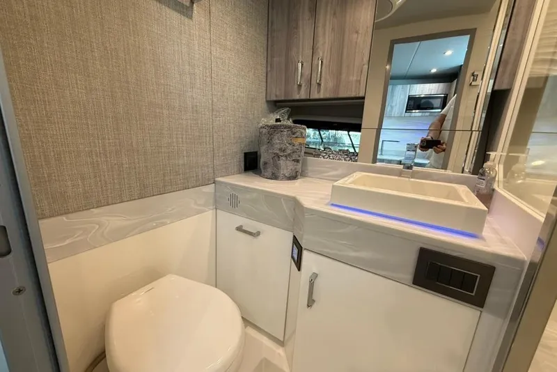 Slide: The Image of Modern interior of 2022 Formula 500 Super Sport Crossover with TV and ambient lighting. - 37