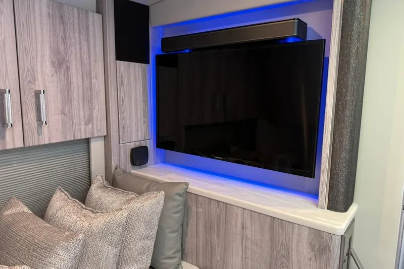 Slide: The Image of Modern kitchen in 2022 Formula 500 Super Sport Crossover with glass cabinet and microwave. - 39