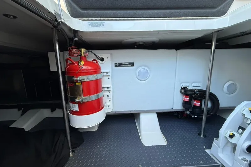 Slide: The Image of 2022 Formula 500 Super Sport Crossover engine room with batteries and wiring. - 52