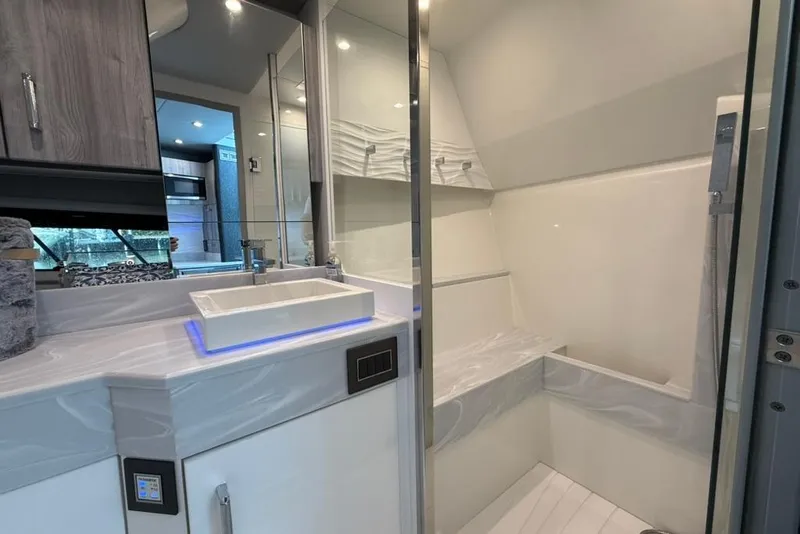 Slide: The Image of Modern bathroom in 2022 Formula 500 Super Sport Crossover boat, featuring sleek design and fixtures. - 59
