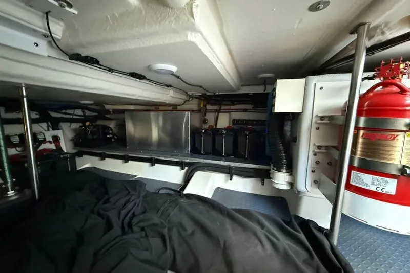 Slide: The Image of 2022 Formula 500 Super Sport Crossover engine room with equipment and wiring. - 75