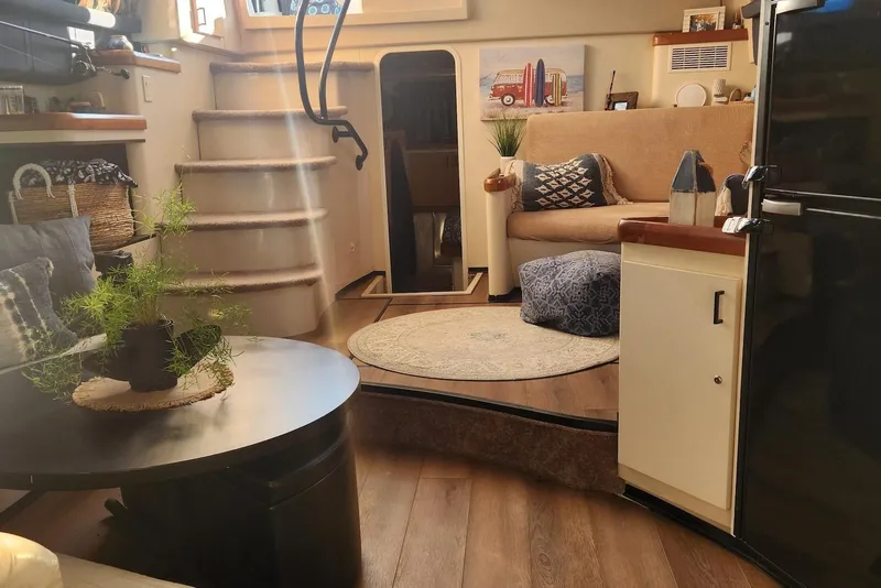 Slide: The Image of Interior of 1995 Mainship 37 Motor Yacht with cozy seating and modern decor. - 3