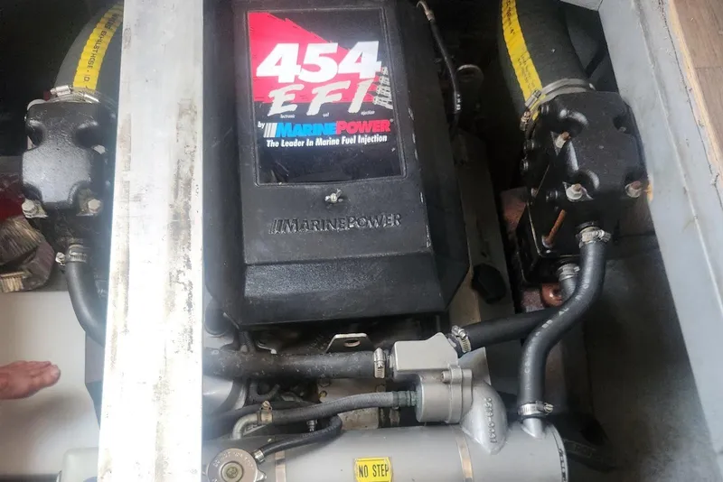 Slide: The Image of Engine compartment of a 1995 Mainship 37 Motor Yacht with Marine Power 454 EFI. - 9