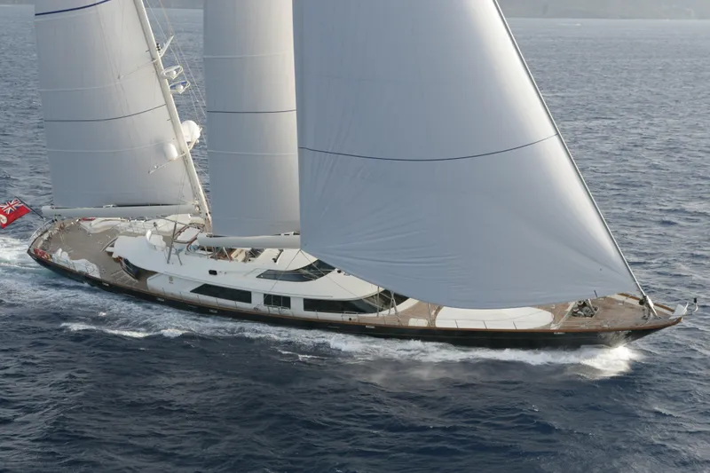 Slide: The Image of Luxurious 2007 Perini Navi 52M sailing yacht gliding on open sea. - 1
