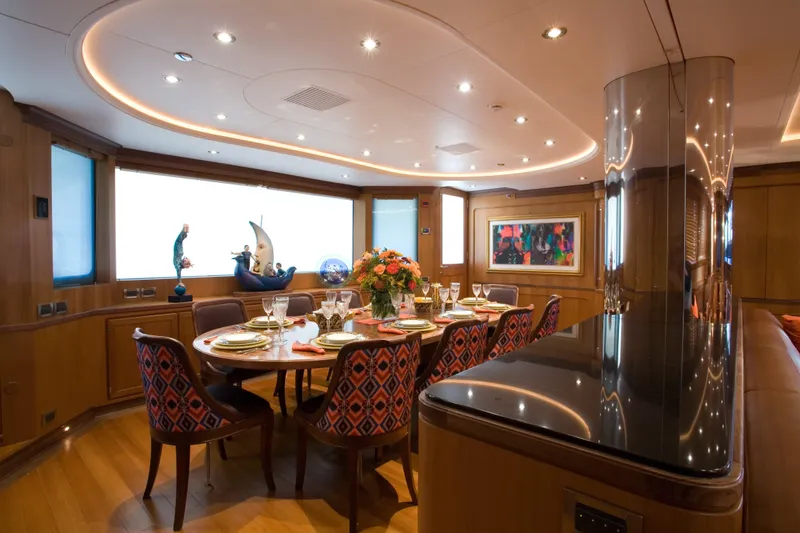 Slide: The Image of Luxurious dining area on 2007 Perini Navi 52M yacht with elegant decor and ambient lighting. - 21