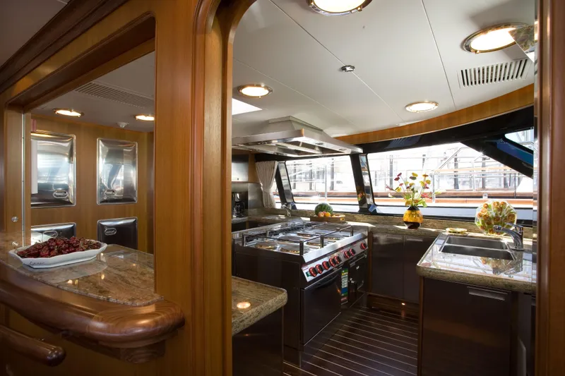 Slide: The Image of Luxurious kitchen interior of 2007 Perini Navi 52M yacht with modern appliances and elegant design. - 24