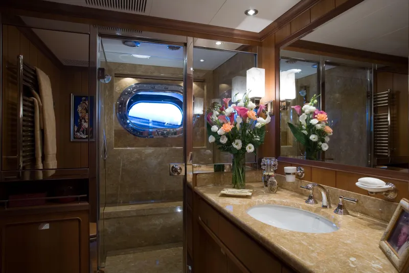 Slide: The Image of Luxurious bathroom on 2007 Perini Navi 52M yacht with elegant marble and floral decor. - 32