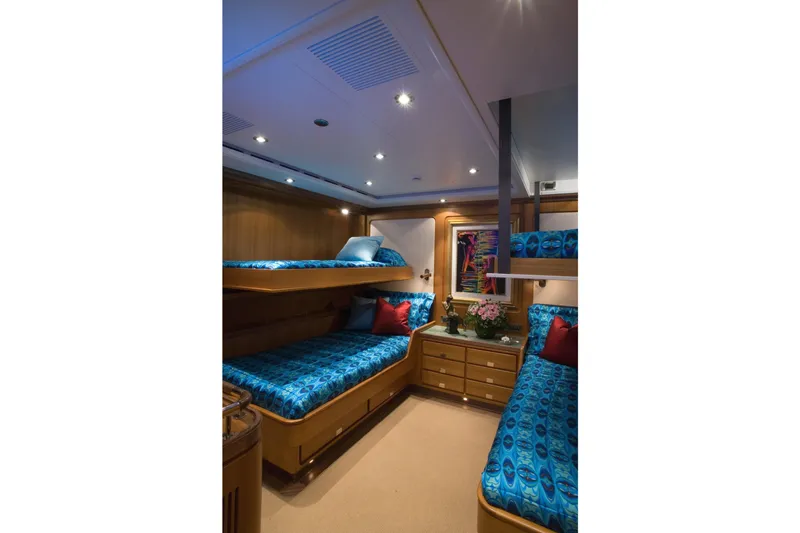 Slide: The Image of Luxurious cabin interior of 2007 Perini Navi 52M yacht with vibrant blue bedding. - 37