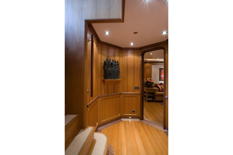 Slide: The Image of Luxurious wooden interior of 2007 Perini Navi 52M yacht, featuring elegant decor and lighting. - 39