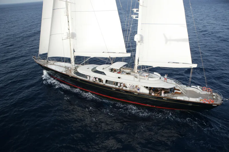 Slide: The Image of Luxurious 2007 Perini Navi 52M yacht sailing on open sea with full sails. - 4
