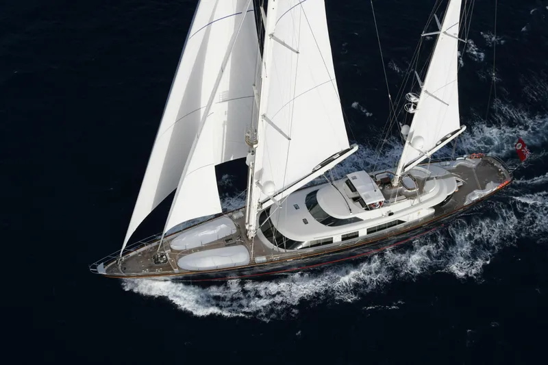 Slide: The Image of Luxurious 2007 Perini Navi 52M sailing yacht cruising on open sea. - 5