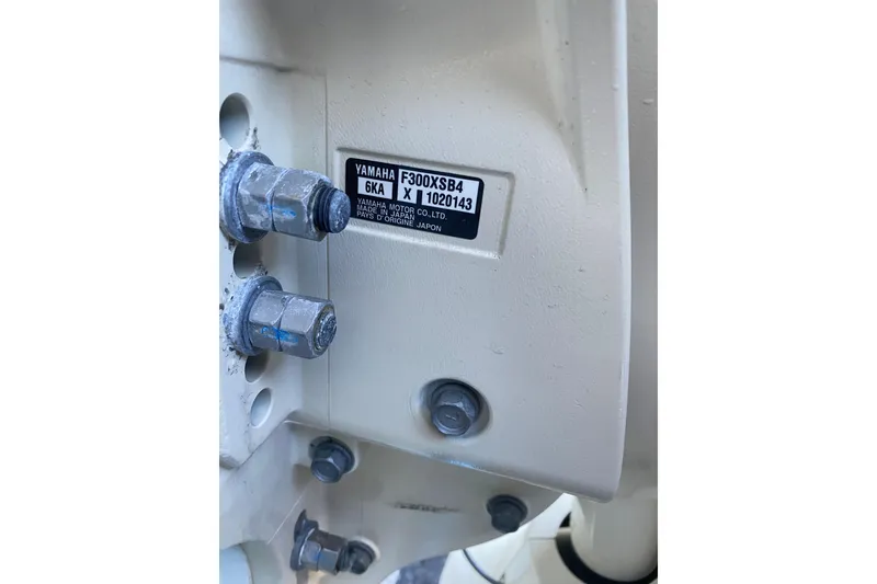 Slide: The Image of Close-up of Yamaha F300XSB4 engine label on 2024 Grady-White Canyon 306 boat. - 18