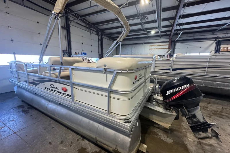 Slide: The Image of 2007 Sun Tracker Party Barge 18 Signature Series pontoon boat with Mercury outboard motor. - 5