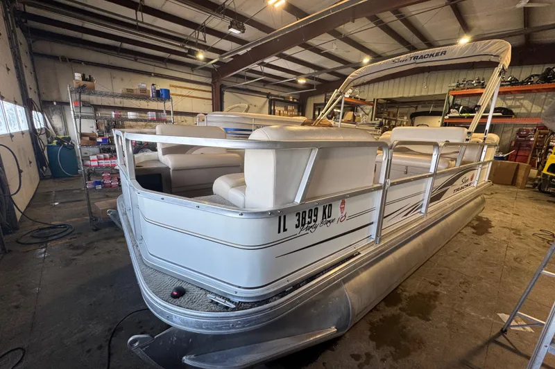 Slide: The Image of 2007 Sun Tracker Party Barge 18 Signature Series pontoon boat in a workshop. - 6