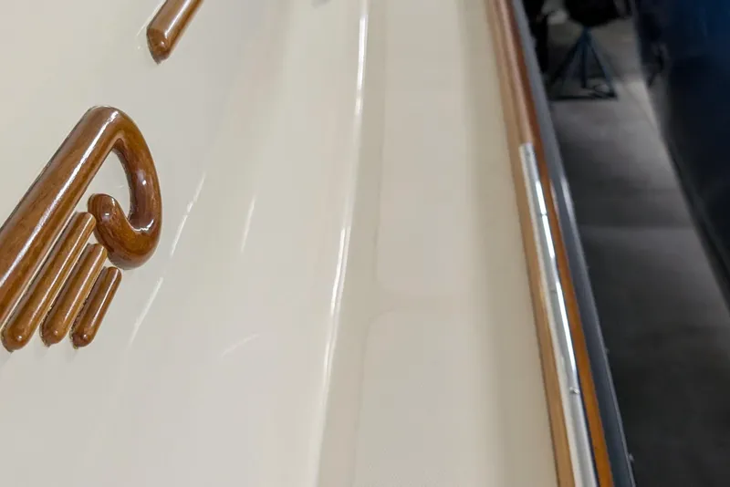 Slide: The Image of 2005 Hinckley Picnic Boat 36 Classic EP, detailed woodwork and sleek design. - 11