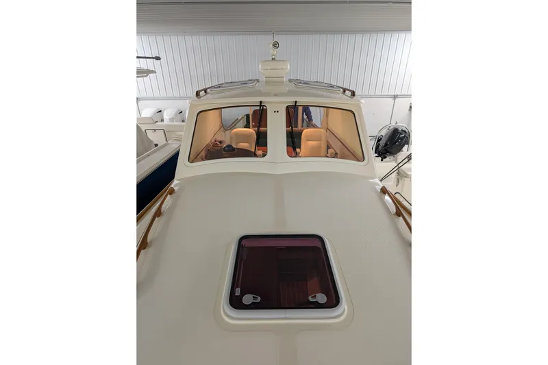 Slide: The Image of 2005 Hinckley Picnic Boat 36 EP, cabin view with sleek design and wooden accents. - 20