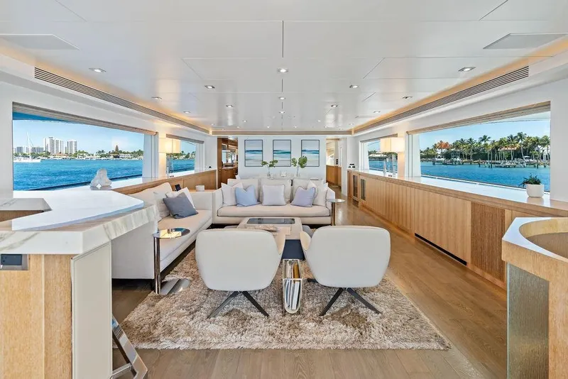Slide: The Image of Luxurious interior of 2014 Horizon RP 110 yacht with elegant seating and panoramic windows. - 20