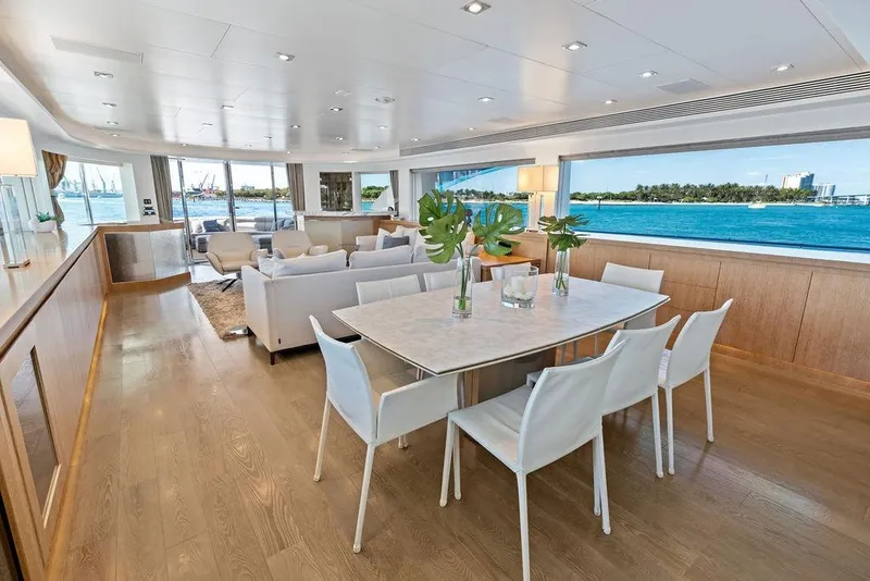 Slide: The Image of Luxurious interior of 2014 Horizon RP 110 yacht with elegant dining and seating area. - 23