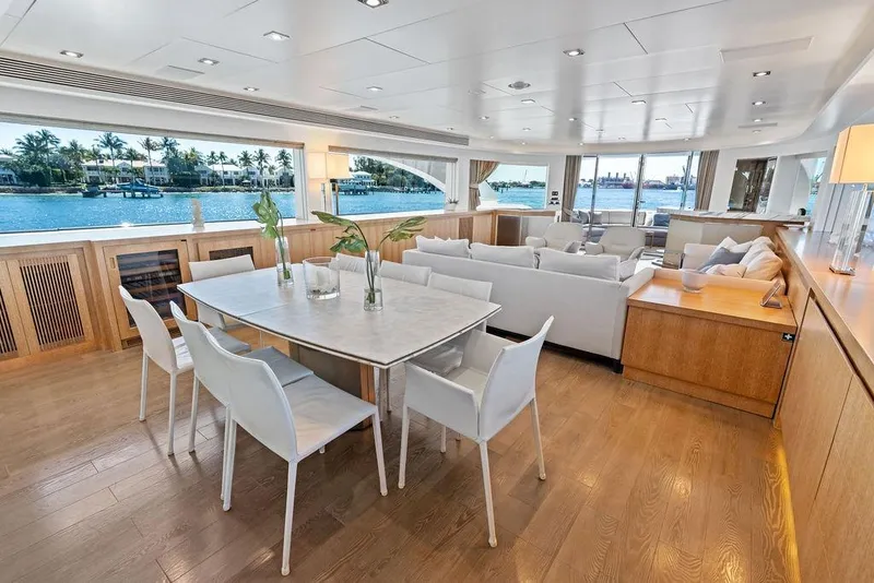 Slide: The Image of Luxurious interior of 2014 Horizon RP 110 yacht with elegant dining and seating area. - 24