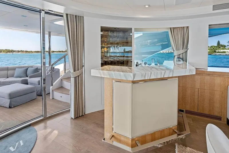 Slide: The Image of Luxurious interior of 2014 Horizon RP 110 yacht with elegant bar and ocean view. - 25