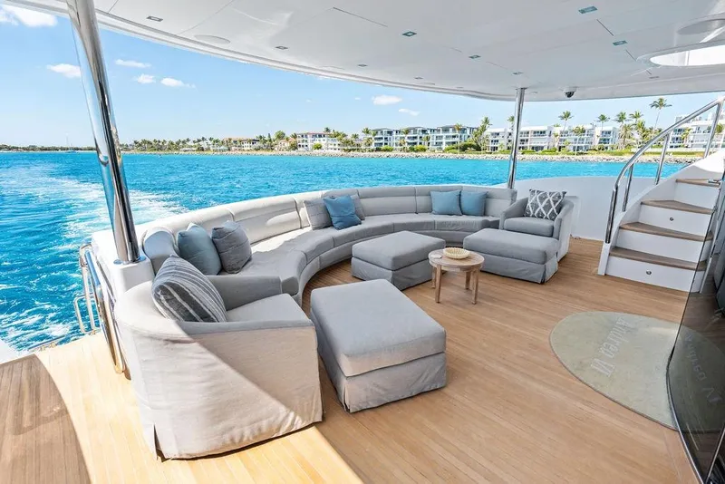 Slide: The Image of Luxurious Horizon RP 110 yacht deck with elegant seating, ocean view, and modern design, 2014 model. - 32