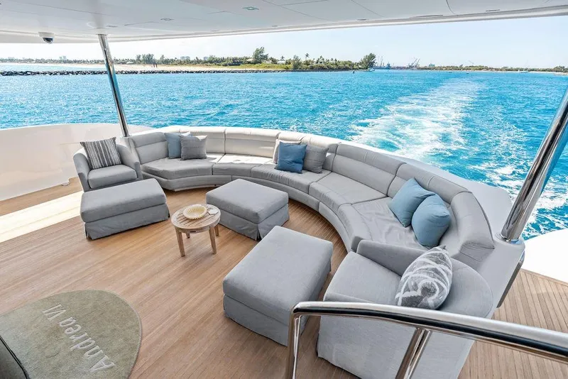 Slide: The Image of Luxurious Horizon RP 110 yacht deck with elegant seating, ocean view, and modern design, 2014 model. - 33