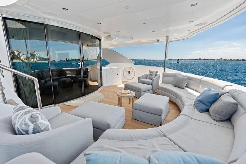 Slide: The Image of Luxurious Horizon RP 110 yacht deck with elegant seating, ocean view, and modern design, 2014 model. - 35