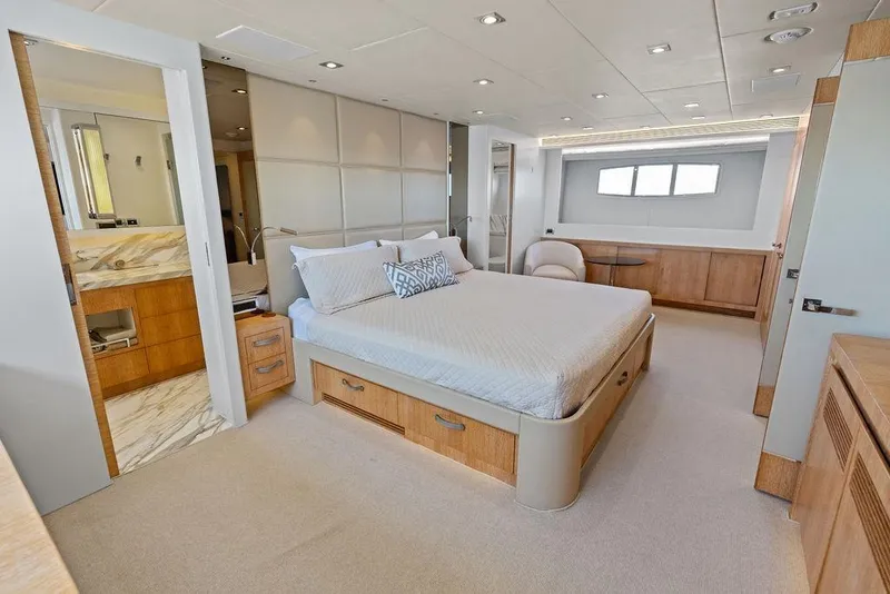 Slide: The Image of Luxurious bedroom interior on 2014 Horizon RP 110 yacht, featuring modern design and elegant furnishings. - 44
