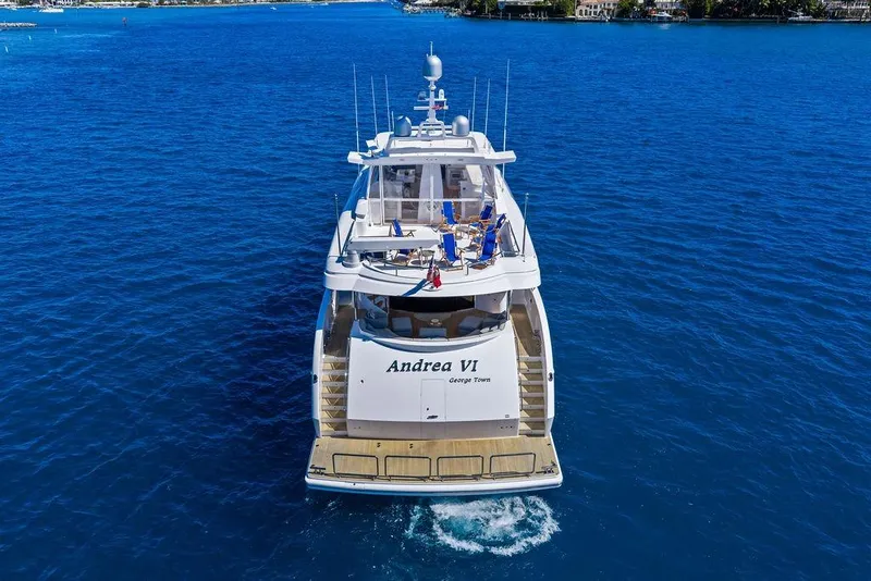 Slide: The Image of Luxury yacht Horizon RP 110, 2014 model, cruising on clear blue waters. - 5