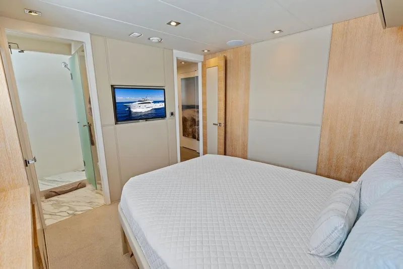 Slide: The Image of Luxurious bedroom interior on 2014 Horizon RP 110 yacht with TV and ensuite bathroom. - 57