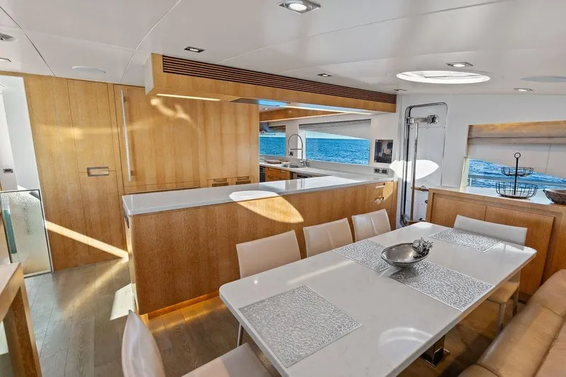 Slide: The Image of Luxurious interior of 2014 Horizon RP 110 yacht with modern dining area and ocean view. - 66