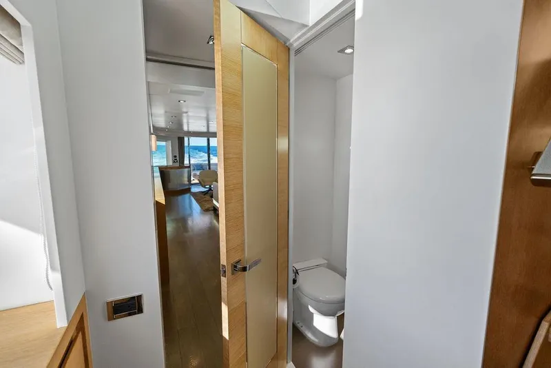 Slide: The Image of Modern yacht interior with bathroom, wooden door, and ocean view, Horizon RP 110, 2014 model. - 71