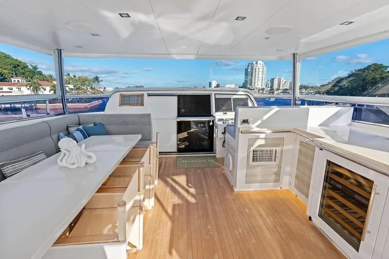 Slide: The Image of Luxurious Horizon RP 110 yacht interior with modern seating and panoramic views, 2014 model. - 76