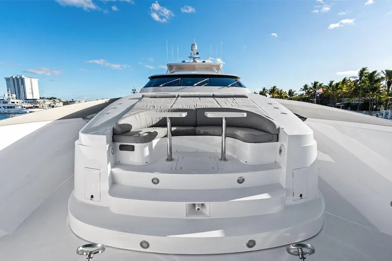 Slide: The Image of Luxurious 2014 Horizon RP 110 yacht deck with seating, under a clear blue sky. - 85