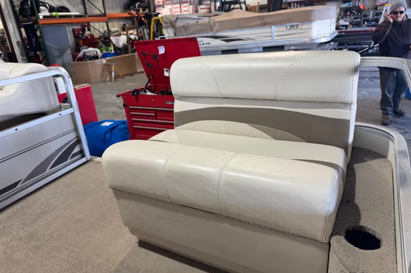 Slide: The Image of 2008 Sun Tracker Party Barge 200 Classic Series seat in a workshop setting. - 9