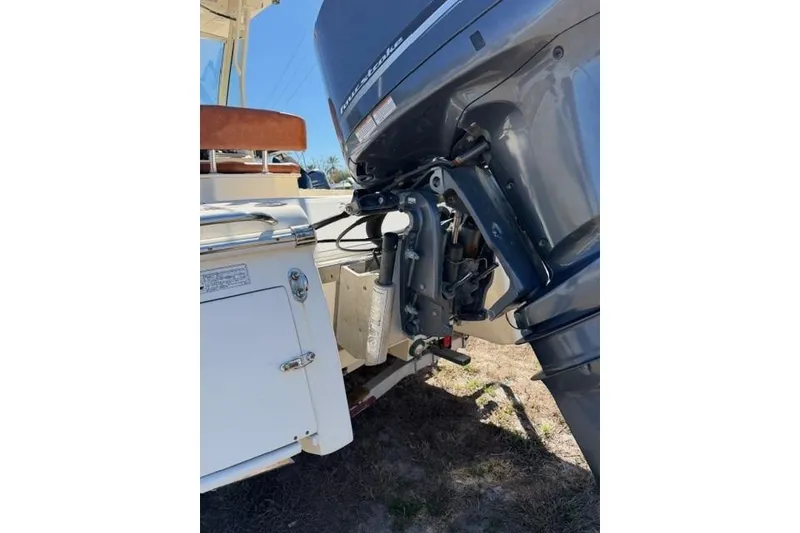 Slide: The Image of 2014 Scout 251 XS boat with outboard motor, rear view. - 8