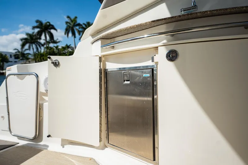 Slide: The Image of 2008 Chaparral Signature 350 yacht kitchen area with stainless steel appliances. - 13