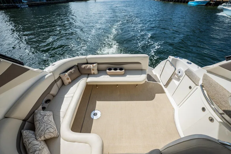 Slide: The Image of 2008 Chaparral Signature 350 boat interior with plush seating and water view. - 15
