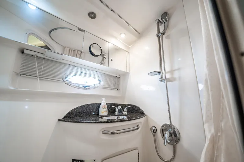 Slide: The Image of Luxurious bathroom in 2008 Chaparral Signature 350 yacht with modern fixtures and elegant design. - 23