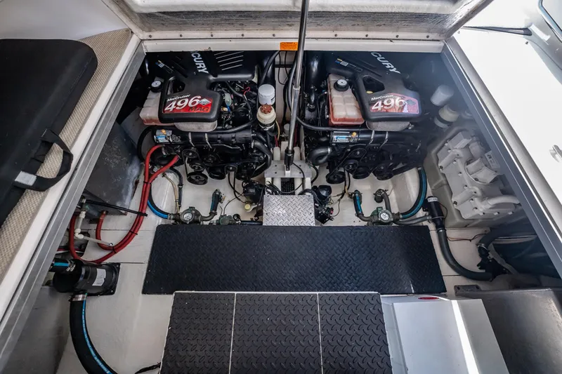 Slide: The Image of Engine compartment of 2008 Chaparral Signature 350 boat with twin MerCruiser 496 MAG engines. - 25